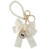 Krémszínű masnis kulcstartó gyöngyökkel BRL362K